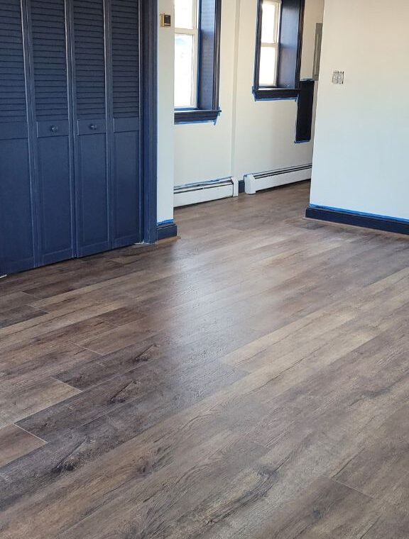 Modern laminate flooring installed by DK Flooring Inc.